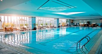 Luxury indoor pool with HVAC and dehumidification services by Aerosmith Mechanical in Toronto and Southern Ontario. Specialized in maintaining pool equipment for optimal performance in high-end properties